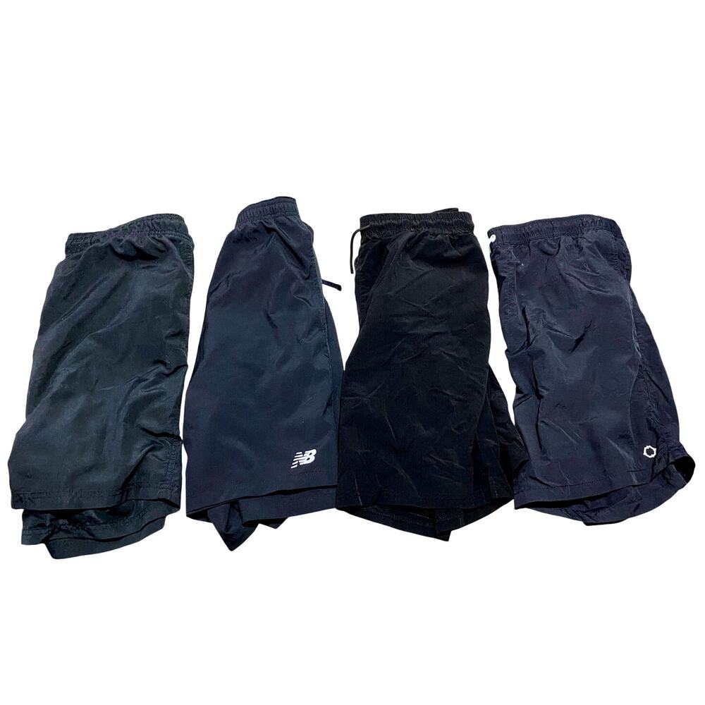 4 Pairs of Black work out shorts size XL and 2XL= all fit similar- 1 New Balance